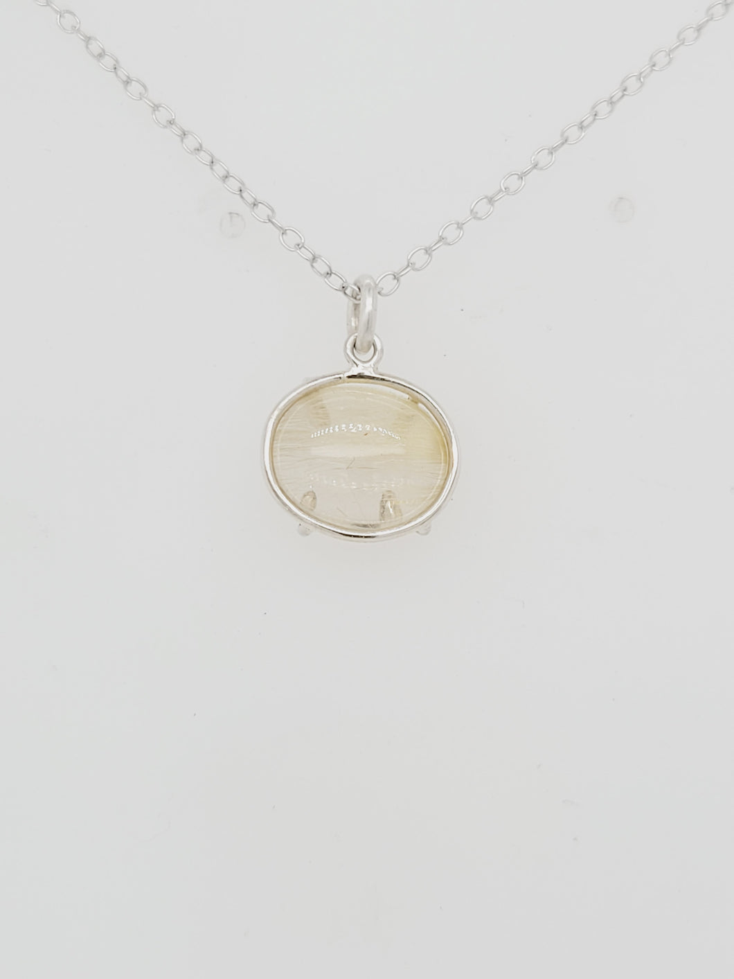 Gold Rutilated Quartz Oval and Sterling Silver Pendant