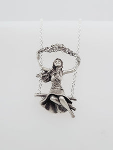 GIRL ON THE SWING NECKLACE