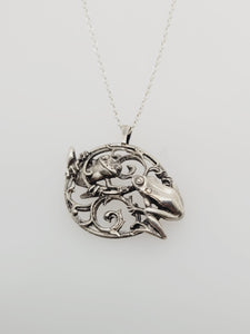 CHARMED FROGS NECKLACE