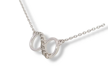 Load image into Gallery viewer, 10KW 1/10 CTW 8 Round Diamond Infinity Pendant