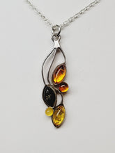Load image into Gallery viewer, Amber and sterling silver pendant