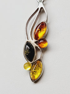 Amber and sterling silver pendant
