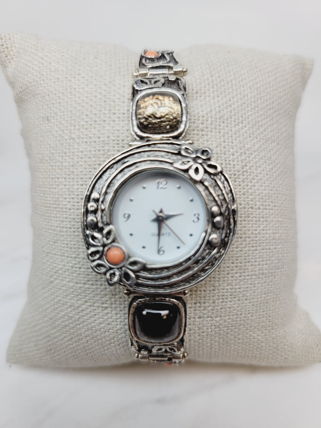 Women's sterling silver floral bracelet watch with coral and smoky quartz