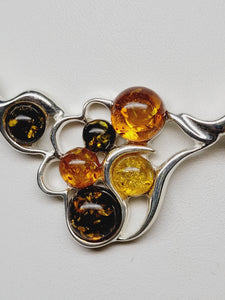 Amber and sterling silver link necklace