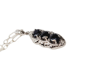 Sapphire, diamond and sterling silver pendant