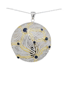 Gold plated & sterling silver pierced round pendant with sapphires